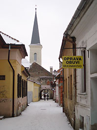 narrow street with arch
